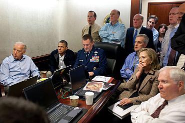 US President Barack Obama and Vice President Joe Biden, Secretary of State Hillary Clinton, Defence Secretary Robert Gates along with members of the national security team, receive an update on the mission against Osama bin Laden in the Situation Room of the White House on May 1