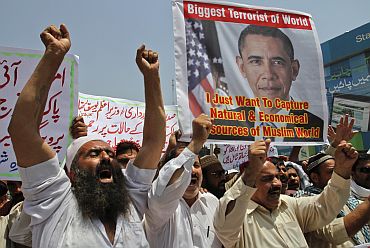 Activists of social group Muthahida Shehri Mahaz shout anti-US protests condemning Osama's killing