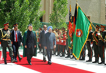 Dr Singh inspecting the Guard of Honour with Hamid Karzai during his recent trip to Kabul