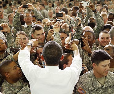 US President Barack Obama greets troops at Fort Campbell in Kentucky. He thanked some members of the elite special forces team involved in the raid that killed Osama bin Laden.