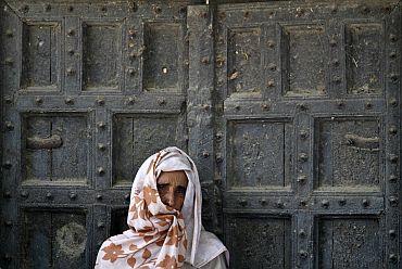 A villager listens to an address given by Rahul Gandhi to a gathering of agitating villagers in Parsaul on Wednesday