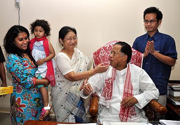 Tarun Gogoi celebrates with family after Friday's victory