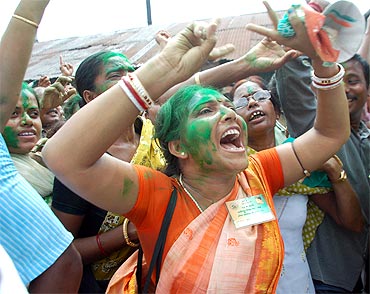 Trinamool supporters celebrate outside Mamata Banerjee's house in Kolkata