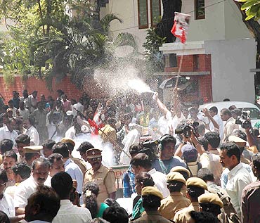 A file photo of partymen outside Jayalalitha's residence in Chennai