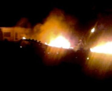 The compound, within which al Qaeda leader Osama bin Laden was killed, is seen in flames after it was attacked in Abbottabad in this still image taken from video footage from a mobile phone