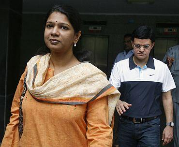 Kanimozhi and Sharad Kumar depart for court from their residence in New Delhi