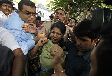 File image of Kanimozhi leaving a court in New Delhi