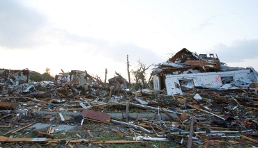 Blocks of homes lie in total destruction after a tornado hit Joplin