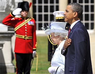 Barack Obama and Britain's Queen Elizabeth stand for the U.S. national anthem at Buckingham Palace