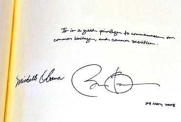 A message from Obama and first lady Michelle Obama, apparently signed by the President with the wrong date in the distinguished visitors' book during a tour of Westminster Abbey