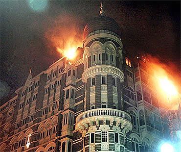 A burning Taj Mahal Hotel in Mumbai during the 26/11 terror strikes