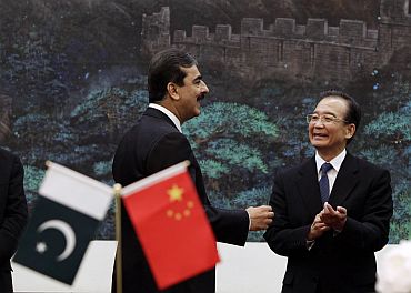 Pakistan Prime Minister Yusuf Raza Gilani with China's Premier Wen Jiabao in Beijing