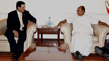 Pakistani Defence Secretary Lt Gen (Retd) Syed Ather Ali speaks to  Defence Minister A K Antony in New Delhi on Monday