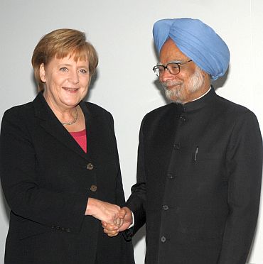 File photo of Merkel with Prime Minister Manmohan Singh