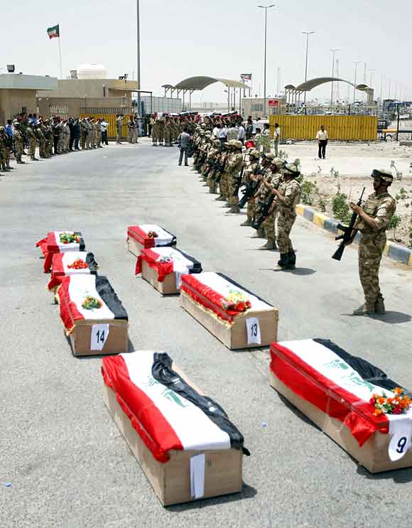 Coffins bearing the remains of Iraqi soldiers who were killed during the 1991 Gulf War