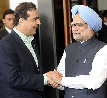 File picture of PM Singh with Pakistan PM Gilani