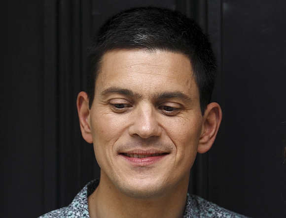 Labour politician David Miliband poses for a photograph outside his home in London