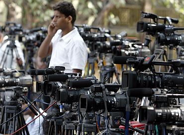 Video cameras of various news channels are placed outside Arthur Road jail in Mumbai