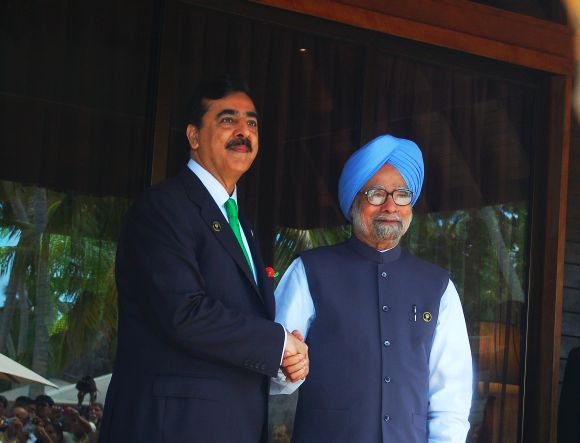 PM Singh meets his Pakistani counterpart Yousuf Raza Gilani during the SAARC summit in Maldives on Thursday