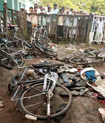A file photo of damaged bicycles and torn footwear of bomb blast victims strewn at the blast site
