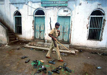 A file photo of a policeman at the blast site in Malegaon