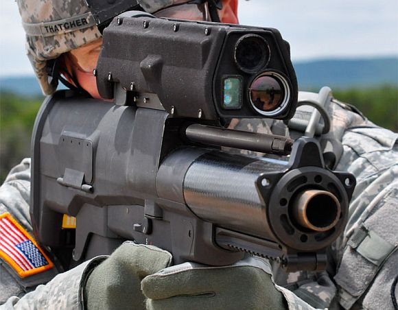 A US soldier with the XM-25 Grenade Launcher
