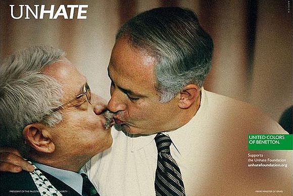 Mahmoud Abbas, head of the Palestinian Authority is shown kissing Israeli Prime Minister Benjamin Netanyahu