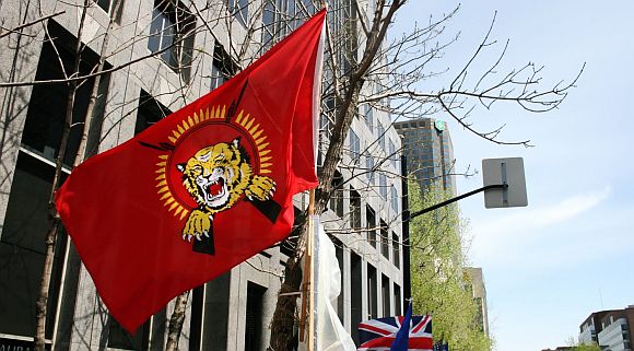 File photo of a LTTE flag being waved during a pro-LTTE protest in London
