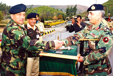A file photograph of former Pakistani president Pervez Musharraf with Lieutenent General Ghulam Mustafa, then commander of Pakistan's Army Strategic Force, during a ceremony to hand over Hatf-111 Ghaznavi missiles at an undisclosed location