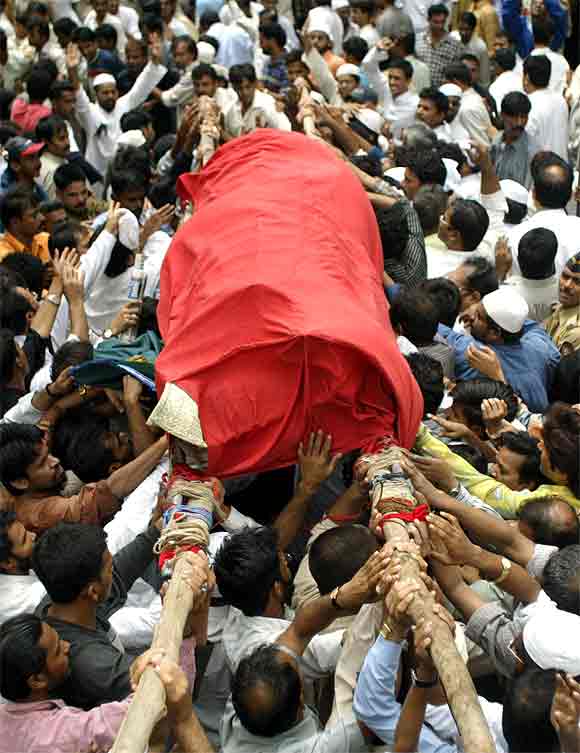 A file photo of mourners carrying the body of Ishrat Jahan