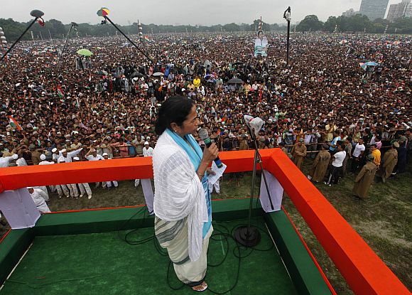 Trinamool Congress chief Mamata Banerjee addresses her supporters during a rally in Kolkata
