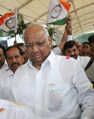 NCP chief Sharad Pawar arrives at Mumbai airport on Friday