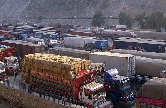 Cargo trucks, including those carrying supplies to NATO forces in Afghanistan, are seen halted along the Pakistan-Torkham border