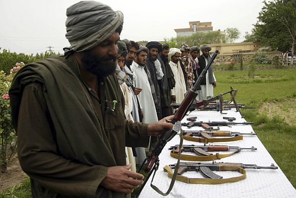 Members of the Taliban voluntarily handed over their weapons and joined the government in Herat