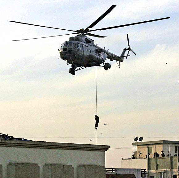 A NSG commando rappels from a helicopter near Nariman House during the 26/11 rescue operation