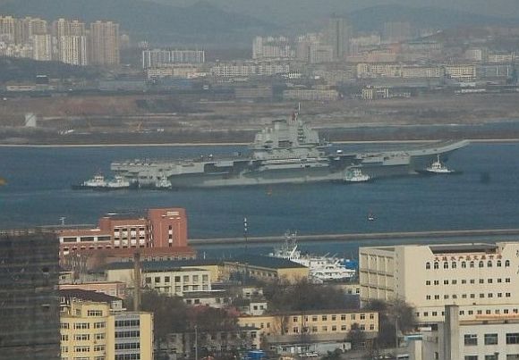 PHOTOS: China's aircraft carrier out for weapons check