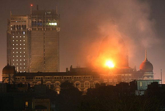 A burning Taj Mahal hotel during the 26/11 attacks in Mumbai