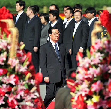 China's President Hu Jintao takes part in a National Day ceremony at Tiananmen Square in Beijing