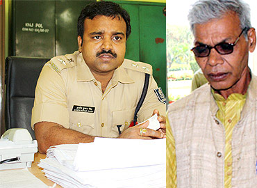 Superintendent of Police Ashish Singh (left) and interlocutor Dandapani Mohanty