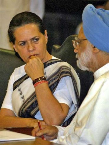 File picture of Congress chief Sonia Gandhi with PM Singh