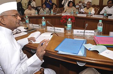 Team Anna members debate the provisions of the Lokpal Bill with government representatives in New Delhi