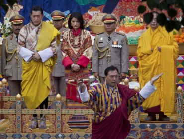 King Jigme Khesar Namgyel Wangchuck and his bride Jetsun Pema take part in a purification ceremony at the Punkaha Dzong during their wedding ceremony in Bhutan's ancient capital Punakha