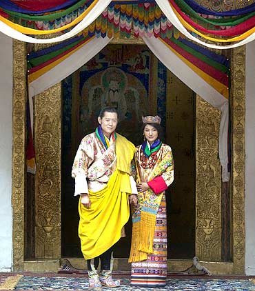 King Jigme Khesar Namgyel Wangchuck and Queen Jetsun Pema pose for pictures after their marriage at the Punkaha Dzong