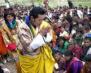 King Jigme Khesar Namgyel Wangchuck and Queen Jetsun Pema greet villagers in Punakha