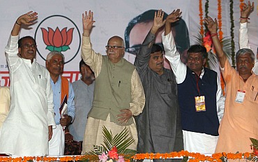 Bhartiya Janta Party's senior leader Lal Krishna Advani with party president Nitin Gadkari