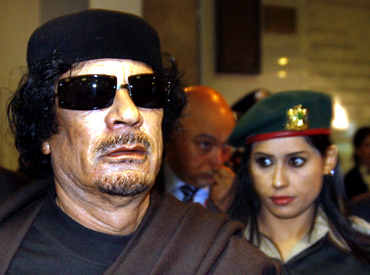 Gaddafi arrives for the Food and Agriculture Organisation Food Security Summit in Rome