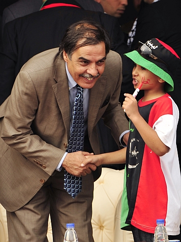 (Left) Ali Tarhouni, Libyan National Transitional Council's minister for oil and finance, in Benghazi