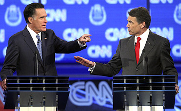 Republican Party's presidential candidates former Massachusetts Governor Mitt Romney (Left) and Texas Governor Rick Perry