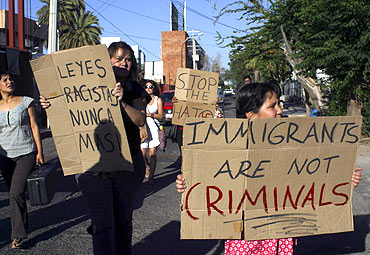 People protest against the crackdown on illegal immigrants