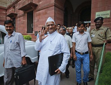 File picture of Anna Hazare and his associates coming out of the finance ministry building after a meeting of the joint drafting committee of the Lokpal Bill